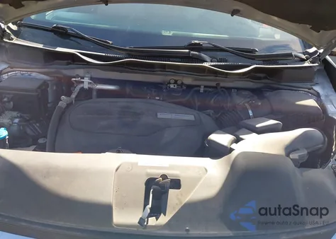 2018 Honda Odyssey Elite z USA, uszkodzony, nr VIN 5FNRL6H91JB070355